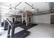 Bright fitness center offers treadmills, weights, and mirrored brick accent walls at 1132 Larkin Dr # 34, Buford, GA 30518