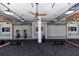 Bright fitness center offers treadmills, weights, and mirrored brick accent walls at 1132 Larkin Dr # 34, Buford, GA 30518