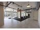 Spacious gym with fitness equipment, exposed ductwork, and mirrored brick accents at 1132 Larkin Dr # 34, Buford, GA 30518