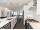 Modern kitchen featuring an island with pendant lighting and stainless steel appliances at 1132 Larkin Dr # 34, Buford, GA 30518