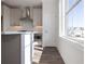 Modern kitchen with stainless steel appliances, and natural light at 1132 Larkin Dr # 34, Buford, GA 30518