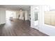 Living room with hardwood floors leads to kitchen and door to outdoor living area at 1132 Larkin Dr # 34, Buford, GA 30518