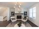 Chic living room features a stone fireplace, elegant decor, and an open, airy design at 1132 Larkin Dr # 34, Buford, GA 30518