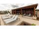 Relaxing lounge area with modern deck chairs under a covered pavilion at 1132 Larkin Dr # 34, Buford, GA 30518