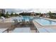 Community pool area with lounge chairs and a covered pavilion for relaxation at 1132 Larkin Dr # 34, Buford, GA 30518