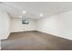 Spacious basement with recessed lighting and neutral carpet, perfect for entertaining or relaxing at 3100 Meadow Dr, Marietta, GA 30062