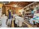 View of the basement with laundry machine, storage racks and tables at 3100 Meadow Dr, Marietta, GA 30062