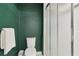 The bathroom features a toilet and enclosed shower with glass door at 3100 Meadow Dr, Marietta, GA 30062