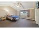 Spacious bedroom with vaulted ceilings and a large window providing natural light at 3100 Meadow Dr, Marietta, GA 30062