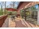 A cozy deck features an outdoor dining area and access to the home at 3100 Meadow Dr, Marietta, GA 30062