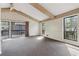 Open living room with deck access, beamed ceilings, and generous natural light at 3100 Meadow Dr, Marietta, GA 30062