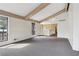 Bright living room with vaulted ceilings, exposed beams, and ample natural light at 3100 Meadow Dr, Marietta, GA 30062
