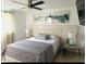 Comfortable bedroom featuring a ceiling fan, modern wall art, and bedside tables at 6308 Boyett Drive Dr, Norcross, GA 30093