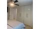 Simple bedroom with ceiling fan and closet space at 6308 Boyett Drive Dr, Norcross, GA 30093
