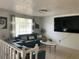 Comfortable living room featuring modern sofas, decorative pillows, and a large TV, perfect for relaxing and entertaining at 6308 Boyett Drive Dr, Norcross, GA 30093