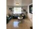 Bright living room with stylish sofas, decorative pillows, and a large window, creating a cozy and inviting space at 6308 Boyett Drive Dr, Norcross, GA 30093