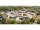 A high-angle aerial view of the neighborhood showcasing the beautiful architectural styles and lush surroundings at 1780 Brookside Lay Cir, Norcross, GA 30093