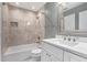 Updated bathroom with sleek vanity, modern fixtures, and tiled shower-over-tub at 3403 Ashwood Ln, Atlanta, GA 30341