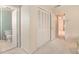 Bedroom showing double closet and a view into the bathroom at 3403 Ashwood Ln, Atlanta, GA 30341