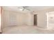 Bright bedroom with double closets and an ensuite bathroom featuring modern tiles at 3403 Ashwood Ln, Atlanta, GA 30341
