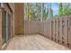 Brick patio with wooden fence offers a private outdoor space at 3403 Ashwood Ln, Atlanta, GA 30341