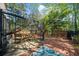 Outdoor deck featuring an enclosed dining area, a grill, and plenty of space for entertaining at 1725 Silverchase Sw Dr, Marietta, GA 30008