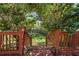 Cozy wood deck leading to a beautifully maintained backyard and lawn at 1725 Silverchase Sw Dr, Marietta, GA 30008