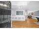 Open foyer with hardwood floors, neutral paint, and dining room view at 1725 Silverchase Sw Dr, Marietta, GA 30008