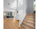 Grand foyer with hardwood floors, staircase, and a view into the living room at 1725 Silverchase Sw Dr, Marietta, GA 30008