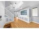 Spacious foyer with hardwood floors and a staircase leading to the second floor at 1725 Silverchase Sw Dr, Marietta, GA 30008