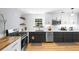 Stylish kitchen with stainless steel appliances, subway tile backsplash, and dark gray cabinetry at 1725 Silverchase Sw Dr, Marietta, GA 30008