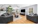 Spacious living room with fireplace, hardwood floors, recessed lighting, and neutral paint at 1725 Silverchase Sw Dr, Marietta, GA 30008