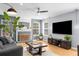 Bright living room features hardwood floors, recessed lighting, and neutral paint at 1725 Silverchase Sw Dr, Marietta, GA 30008