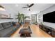 Cozy living room with fireplace, recessed lighting, hardwood floors, and neutral paint at 1725 Silverchase Sw Dr, Marietta, GA 30008