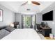 View of a main bedroom with a work space and bay window that provides ample natural light at 1725 Silverchase Sw Dr, Marietta, GA 30008