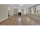 Living room with a fireplace and hardwood floors at 272 Colchester Dr, Stone Mountain, GA 30088