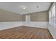 Cozy living room featuring wood-look flooring and neutral wall colors at 272 Colchester Dr, Stone Mountain, GA 30088