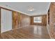 This room features wood paneling and hardwood floors at 272 Colchester Dr, Stone Mountain, GA 30088