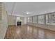 Bright sunroom has hardwood floors and lots of windows at 272 Colchester Dr, Stone Mountain, GA 30088