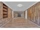 Living room with a brick fireplace and hardwood floors at 272 Colchester Dr, Stone Mountain, GA 30088