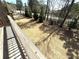 Large backyard view from a wooden deck overlooking the open yard at 3567 Hidden Valley Cir, Lawrenceville, GA 30044