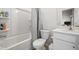 Bathroom with a shower over the tub, toilet, and vanity with a white countertop at 3567 Hidden Valley Cir, Lawrenceville, GA 30044