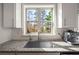 Modern kitchen features granite countertops, stainless steel appliances, and a double window above the sink at 3567 Hidden Valley Cir, Lawrenceville, GA 30044