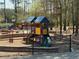 Community playground with a variety of colorful play structures for children at 3567 Hidden Valley Cir, Lawrenceville, GA 30044