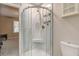 Modern shower with marble-style walls, seating, and a chrome shower head at 403 Oak Harbor Ct, Marietta, GA 30066