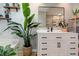 Bright bathroom featuring a modern vanity with black hardware, white countertops, and stylish decorations at 403 Oak Harbor Ct, Marietta, GA 30066