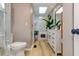 Bathroom features skylight, shower, vanity, plants, and modern fixtures at 403 Oak Harbor Ct, Marietta, GA 30066