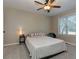 Bright bedroom with a ceiling fan and neutral tones, creating a relaxing and inviting atmosphere at 403 Oak Harbor Ct, Marietta, GA 30066