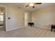 Bedroom featuring a ceiling fan, carpeted floor, and neutral wall color at 403 Oak Harbor Ct, Marietta, GA 30066
