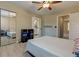 Bright bedroom boasts a mirrored closet and serene neutral tones, offering a tranquil and inviting space at 403 Oak Harbor Ct, Marietta, GA 30066
